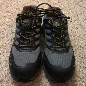 Brand new puma steel toe work shoes.